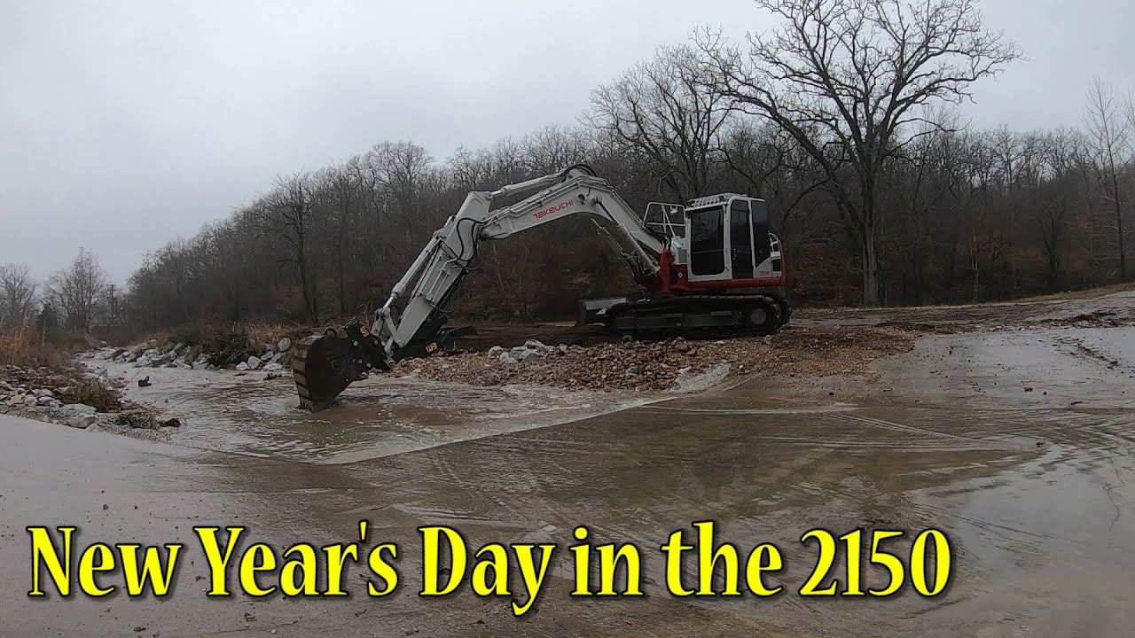 Grading A Creek Bank With The 2150