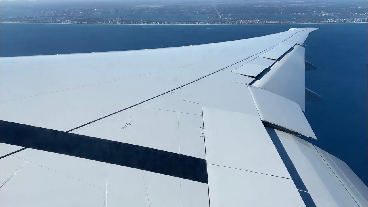 Beautiful clear day reverse ops landing! - American Airlines 777-300ER approach and landing into MIA
