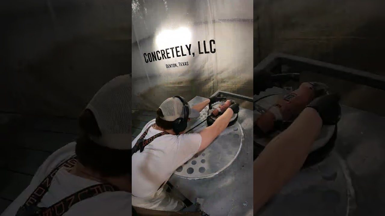 polishing a concrete coffee table with inlay