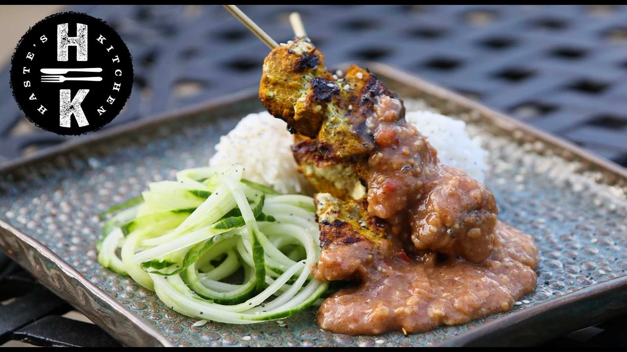 Chicken satay, hot peanut sauce, rice balls and spiralized cucumber