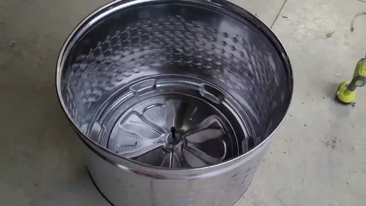DIY spinning smokeless fire pit made from top-load washing machine