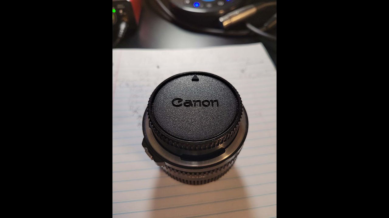 How to lock Canon nFD rear lens cap
