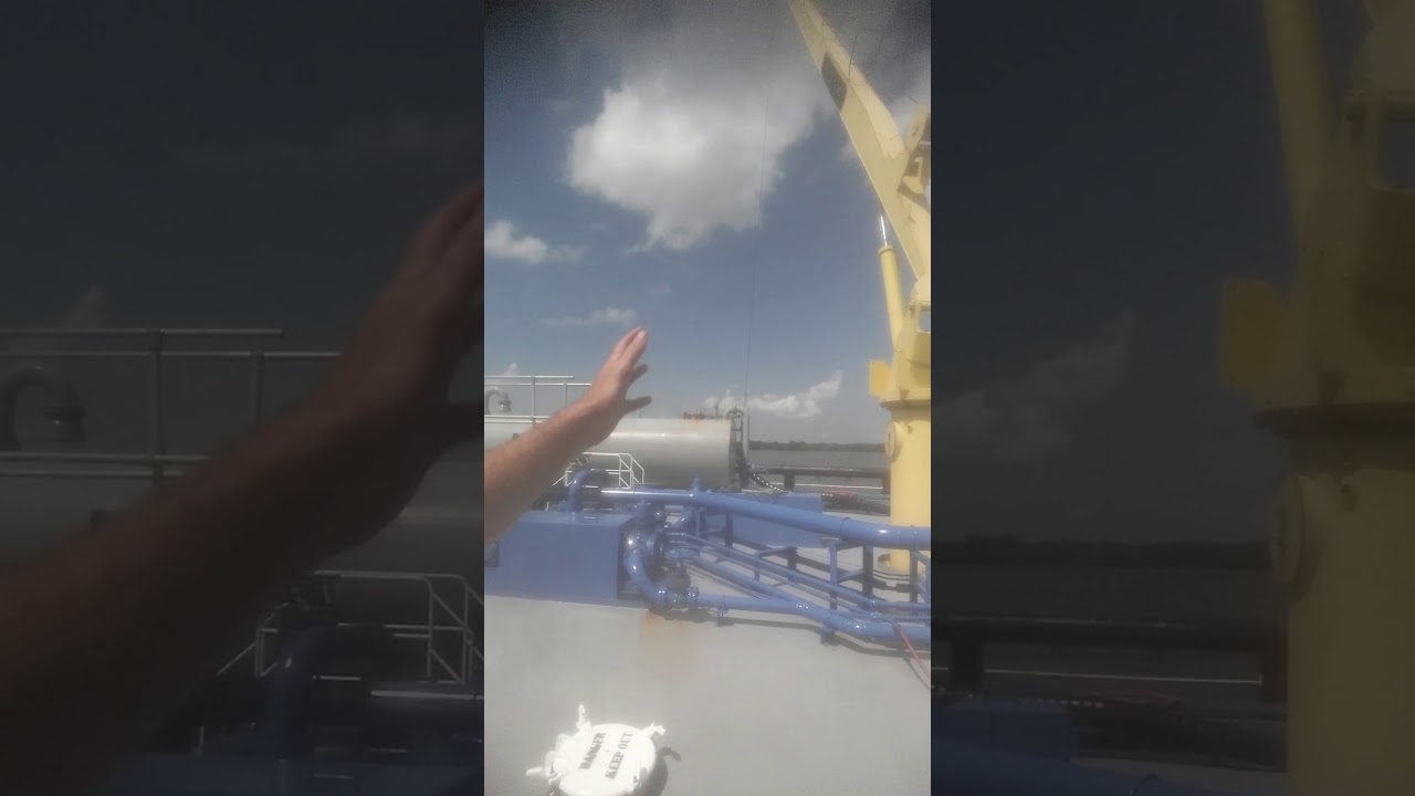Barge to barge fuel transfer on Mississippi River.