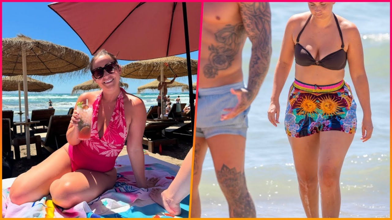 Jacqueline Jossa shows off her figure in a pink swimsuit as she visits the beach with husband Dan