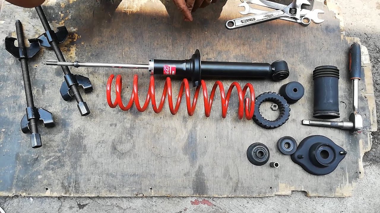 LEAKING REAR SHOCK ABSORBER HOW TO REPLACE