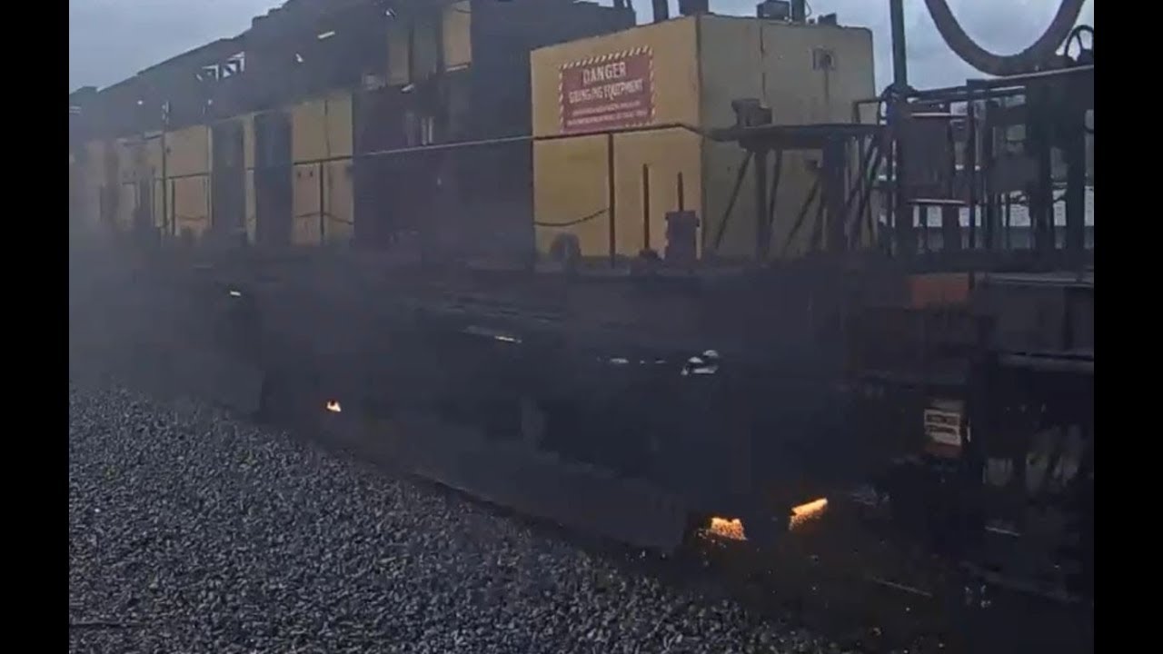 LORAM RAIL GRINDER WITH MOW!   WAUPACA, WI  2 Weeks after Deshler, OH!