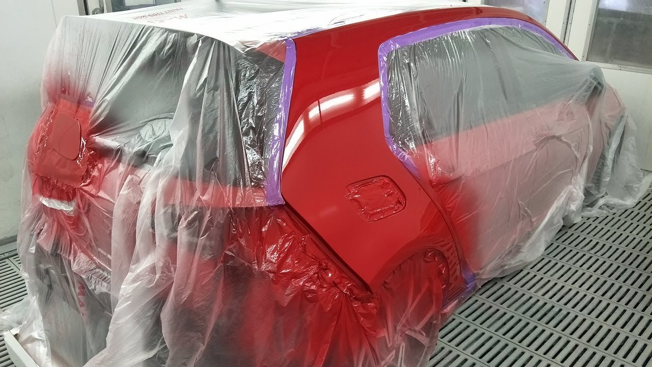 Red VW Golf Spray Painting