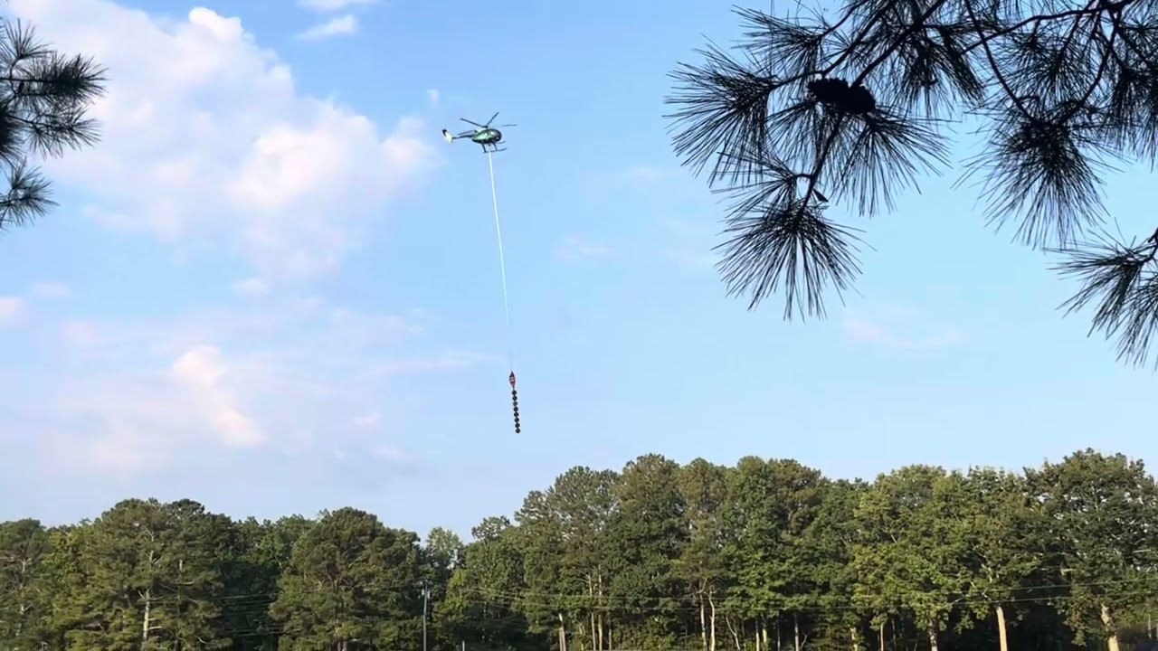 Helicopter chainsaw  woke up to this going on in my backyard this AM power company trimming trees!
