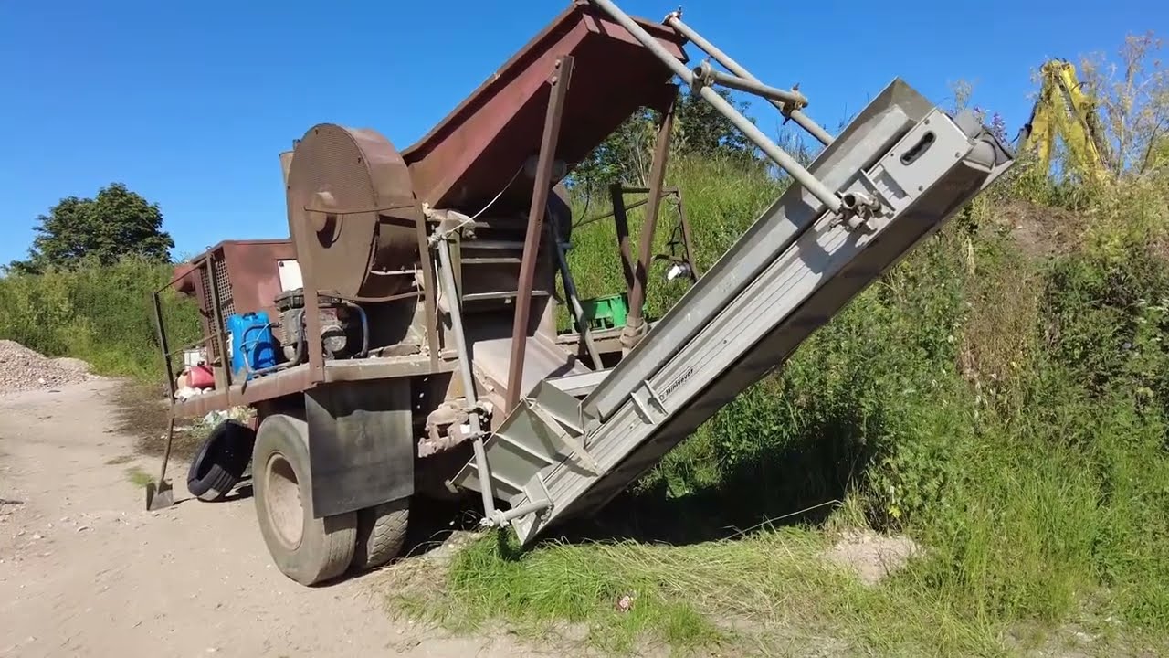 See 1 full day of crushing with a 5ton jaw crusher and LB110 NH backhoe loader