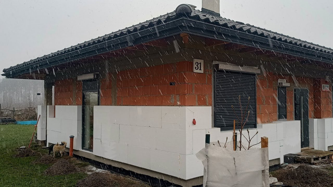 Przyklejanie styropianu zimą. Dom Galia akcja styropian