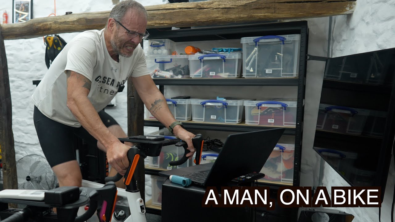 An Old Man Riding A Bike Indoors. Badly.
