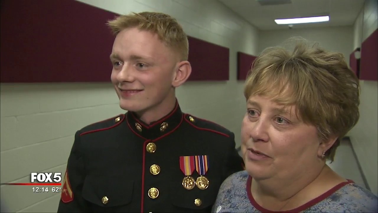 Dawson County teacher surprised by Marine son on Veterans Day