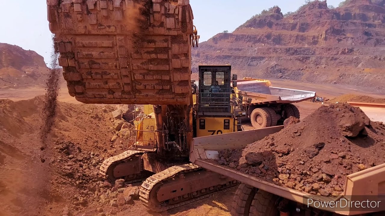 KOMATSU PC 2000 SHOVEL LOADING CAT 777D & KOMATSU HD 785
