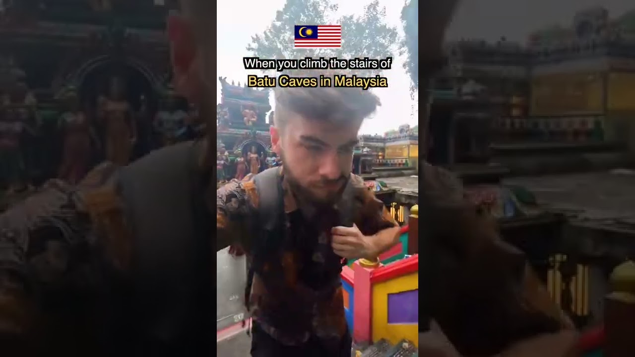 Climbing The Stairs Of Batu Caves In MALAYSIA