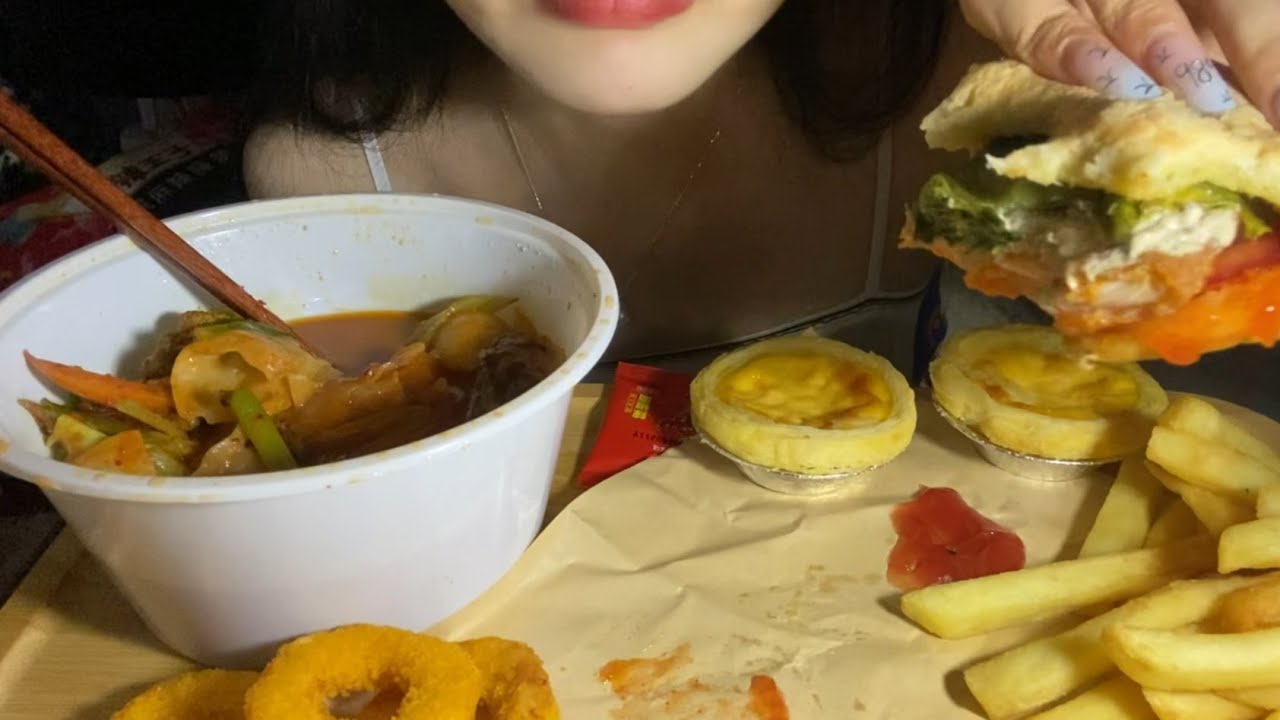 Hamburger, french fries and spicy fried intestines.