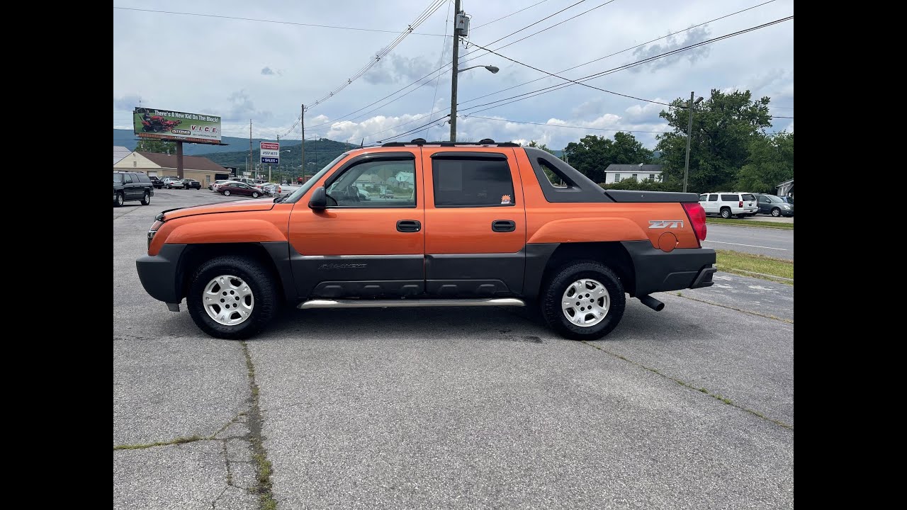 Chevrolet Avalanche faded trim with heat gun and Carworx Refinish Restorer. Restoring faded trim.