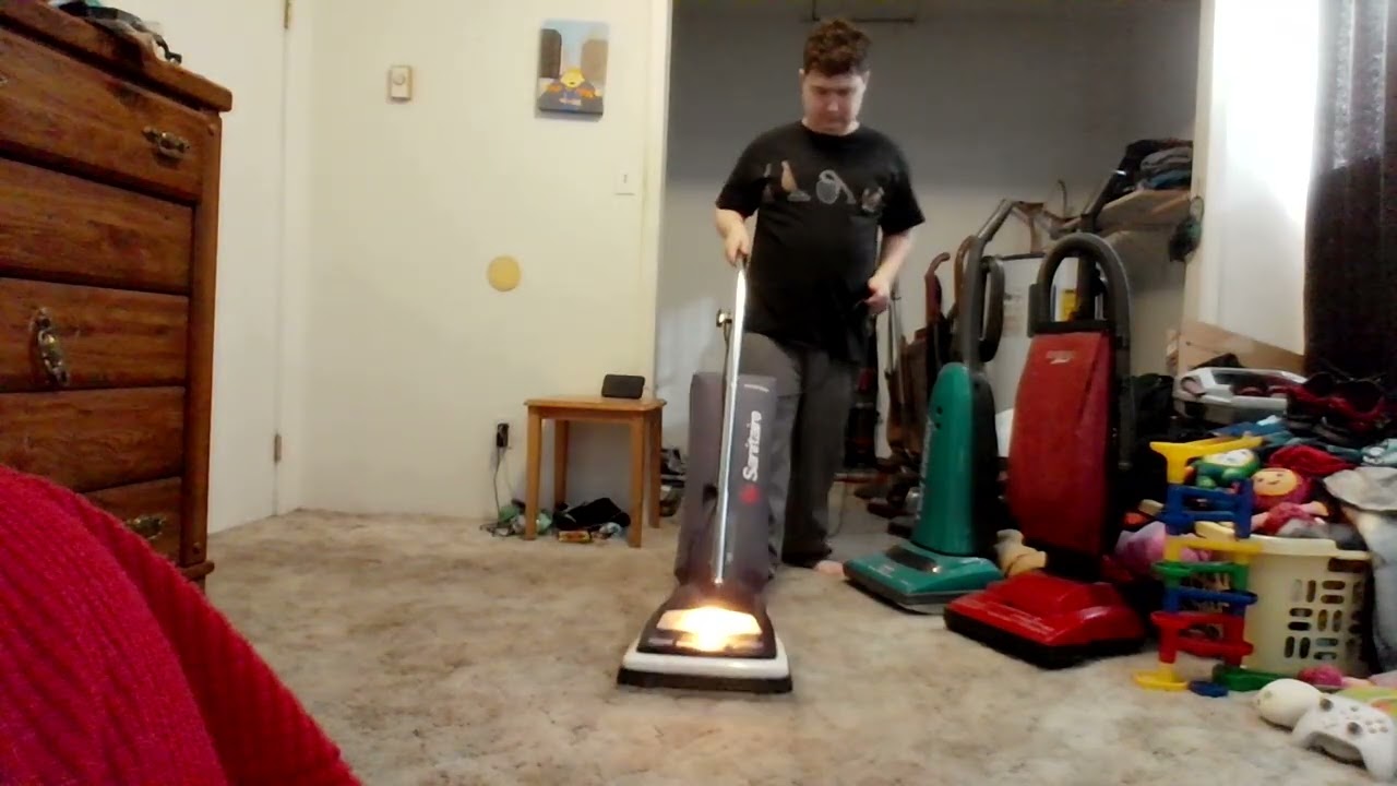 vacuuming the bedroom with 2000 sanitaire s649 type a