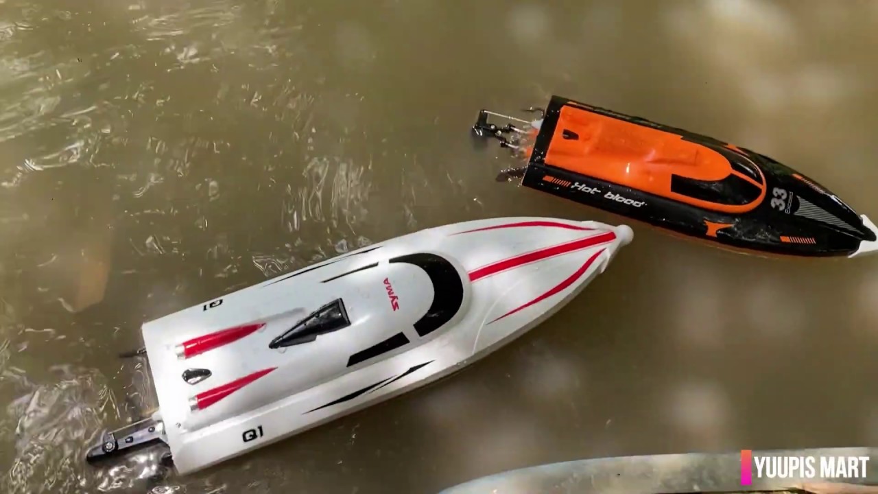 Syma Q1 and Q2 Pioneer High Speed Electric RC Boat Unboxing and performance test.
