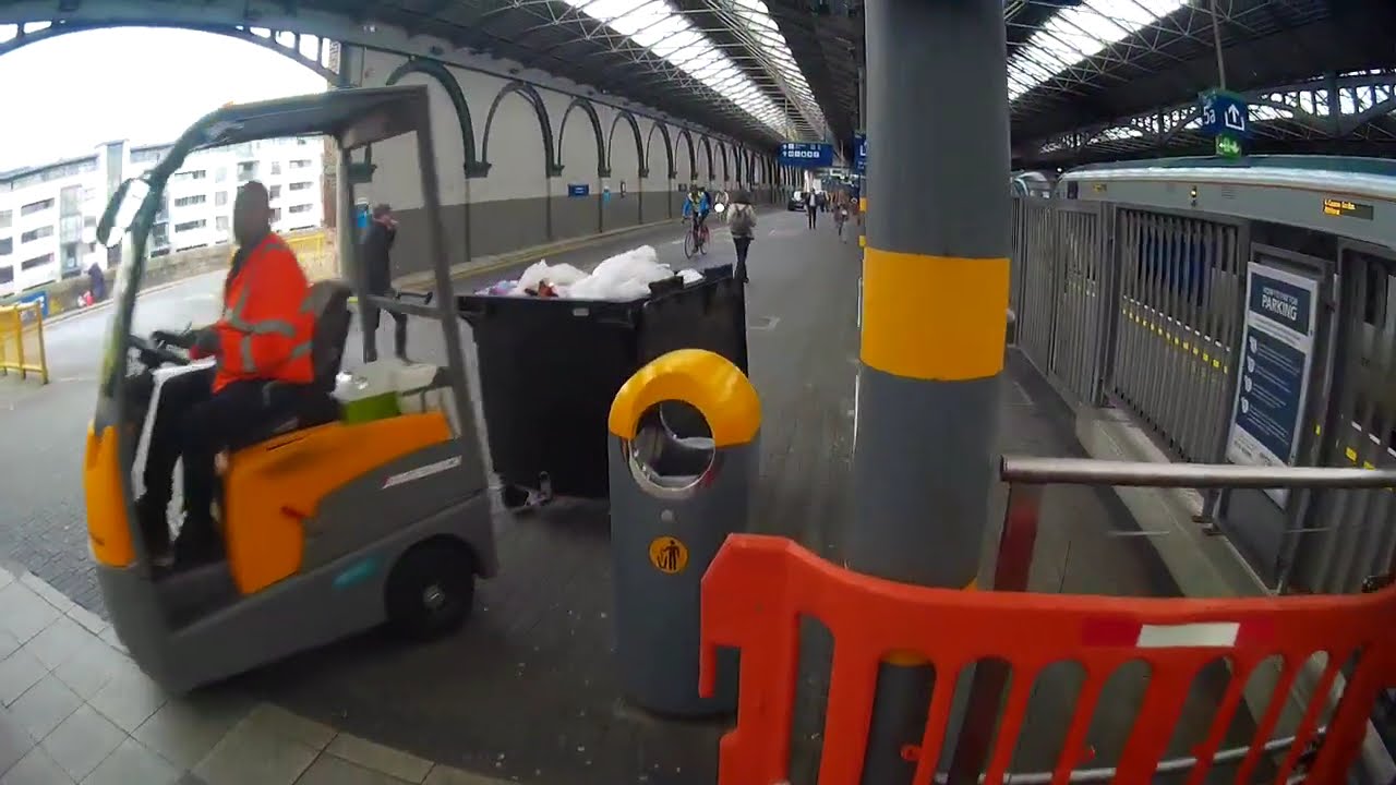 Blind passenger walking from bus stop on lower concourse to Customer Service Desk in Heuston.