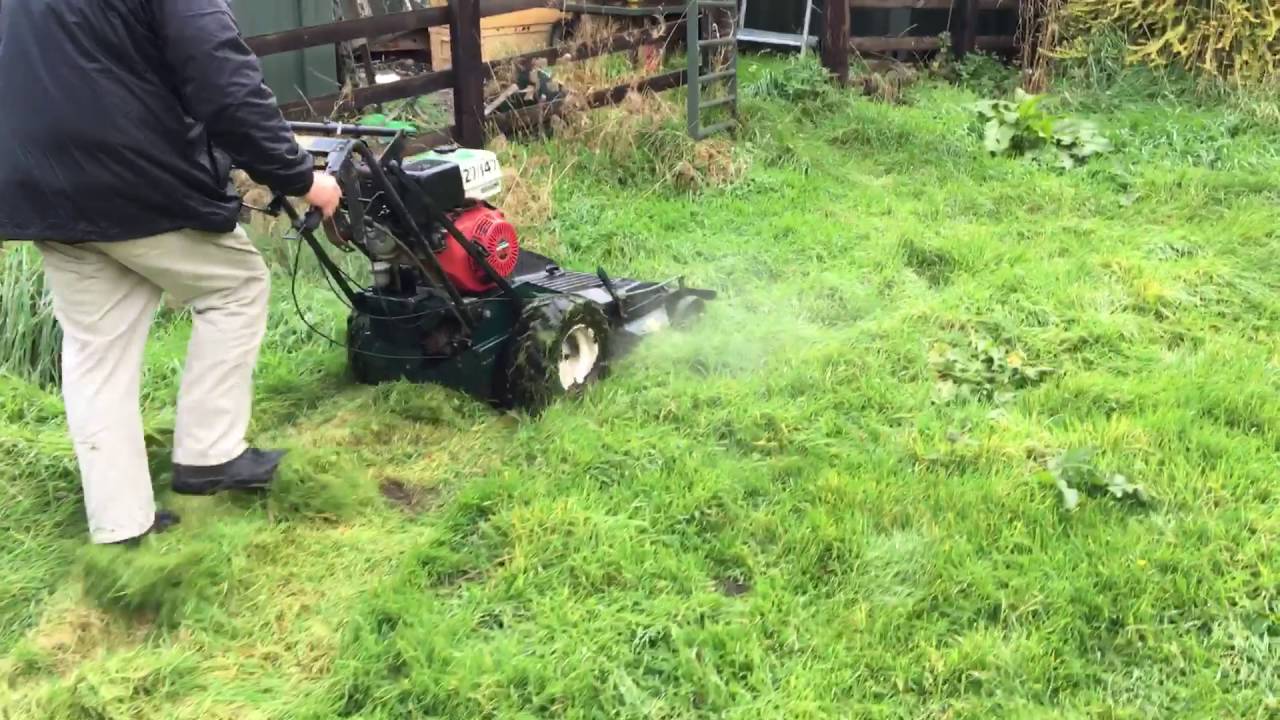 Hayter Condor self drive Mower on thick wet grass