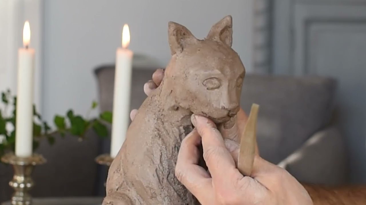 How to make a Cat in clay. Make bigger sculptures by cutting in half. #catsculpture #clay #sculpting