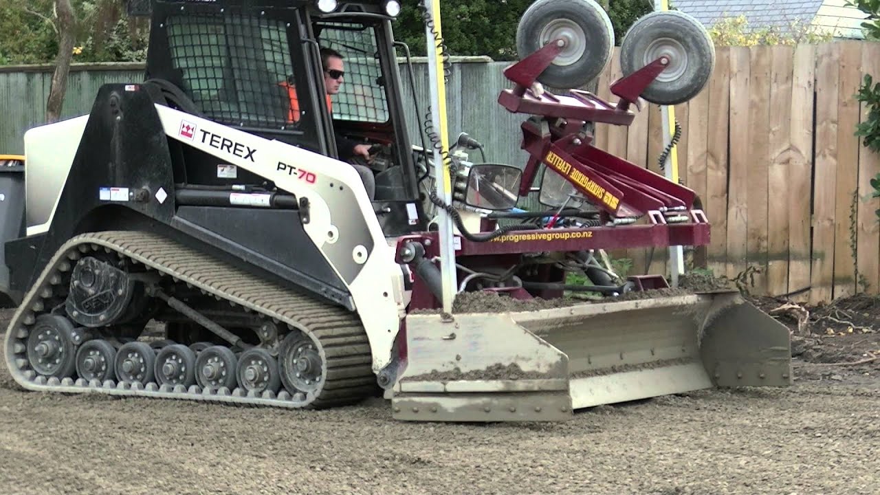 SharpGrade Laser Grader on PT70 operating with wheels retracted