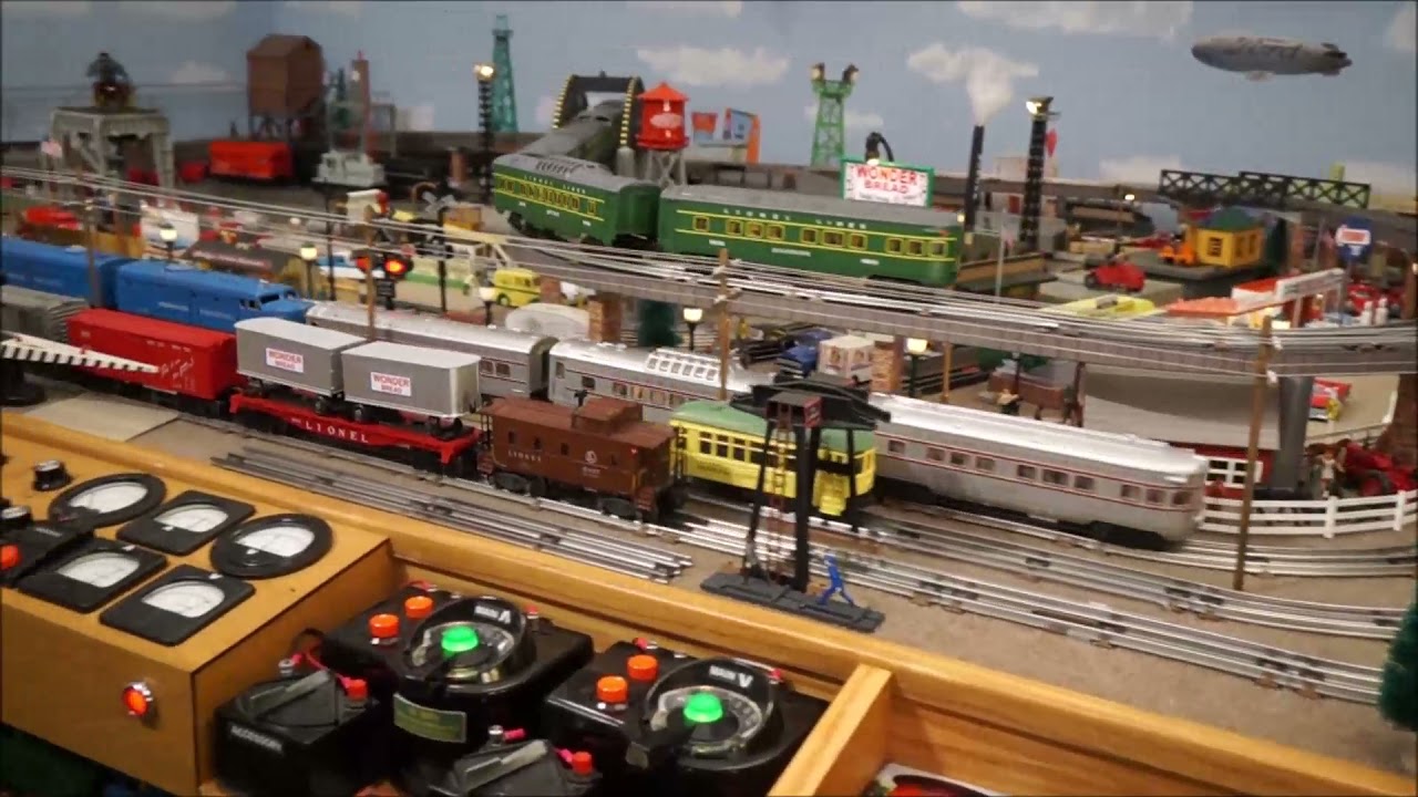 Lionel 027 Postwar(mostly) Layout.  4 Trains and a Trolley.