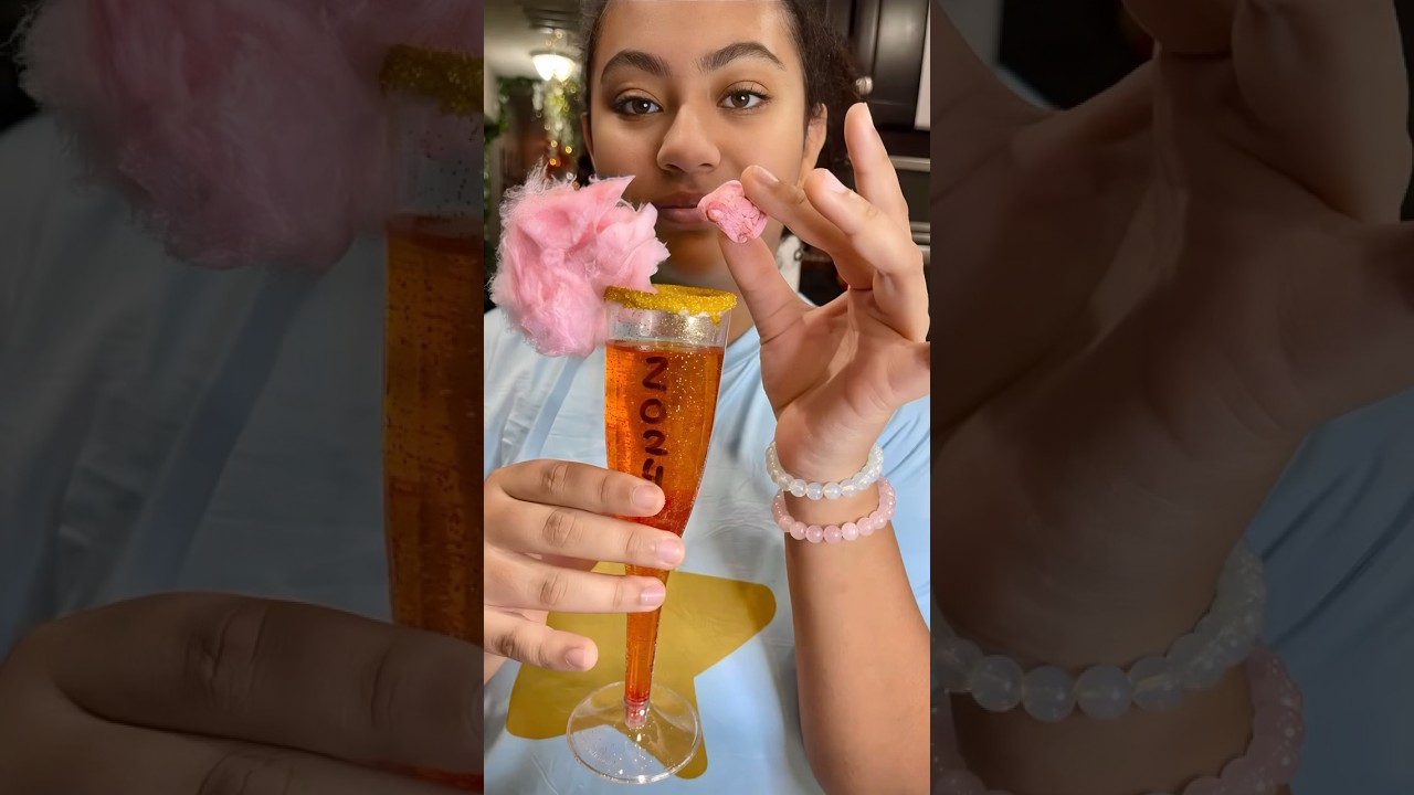 Cotton Candy Glitter Bomb Mocktail #easyrecipe #cocktail #mocktailrecipes #mocktail #drinks