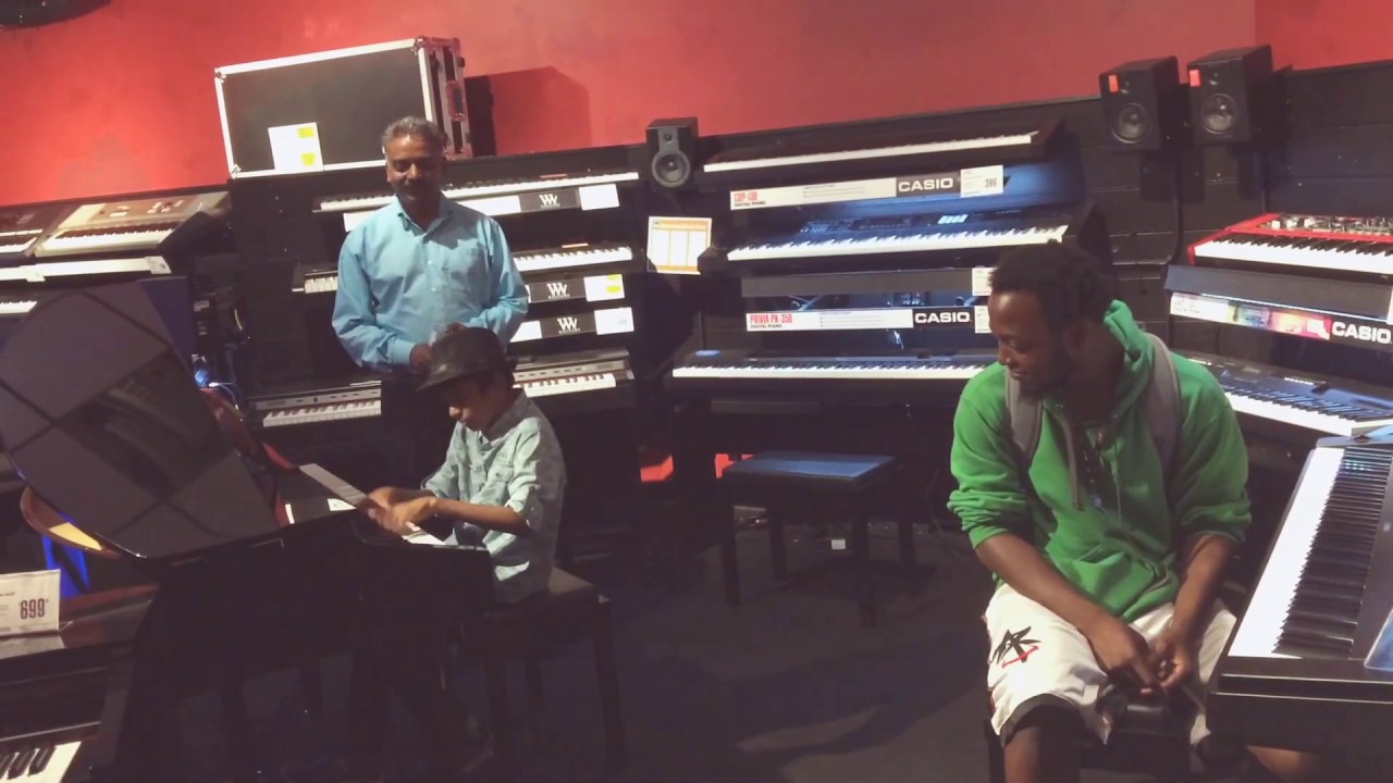 Lydian Nadhaswaram in a Music store Miami