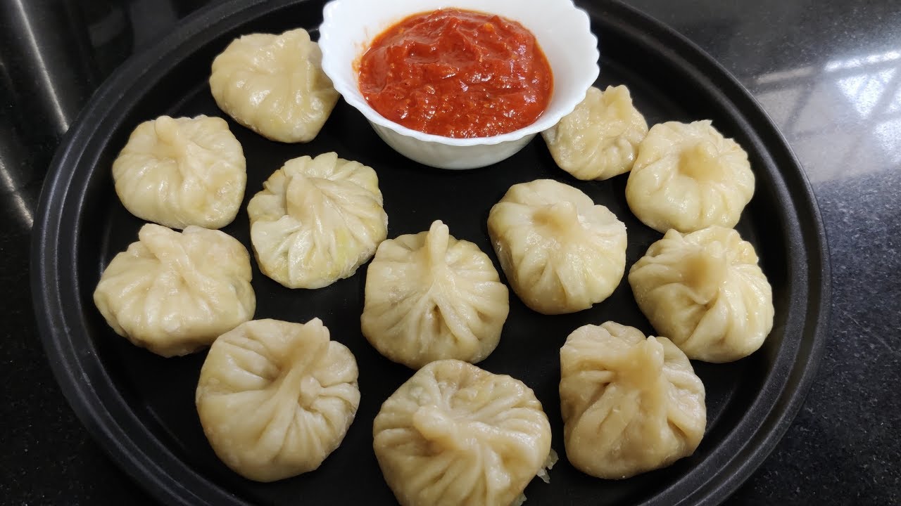 Chicken Momos|ചിക്കൻ മോമോസ്|Steamed Chicken Momo With Chutney|ആവിയിൽ വേവിച്ചചിക്കൻ മോമോസുംചട്നിയും