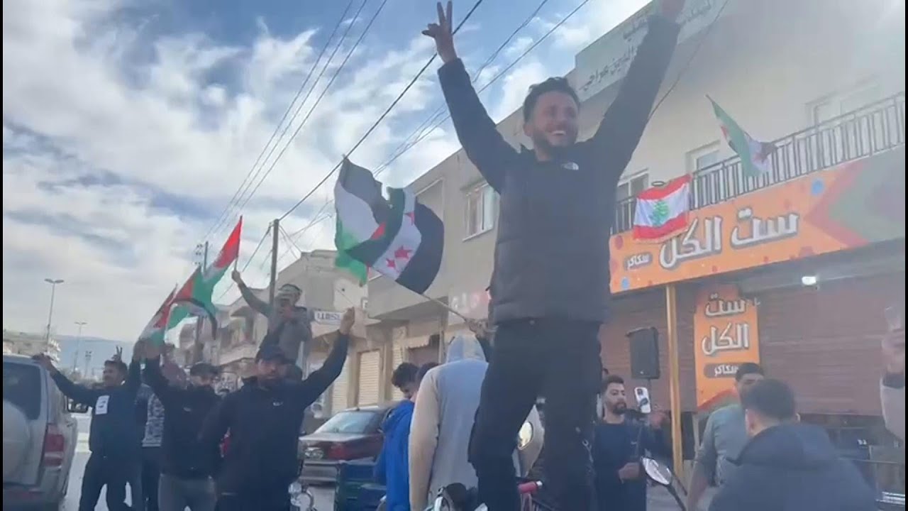 Syrians in Lebanese towns by the border celebrate the fall of Assad's government