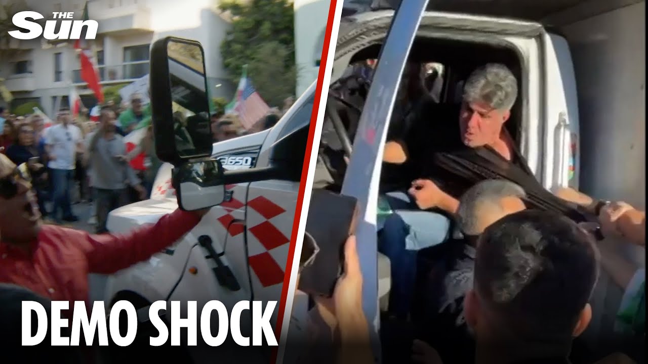 Moment truck ploughs into crowd of Iranian protesters in LA before cops drag driver away