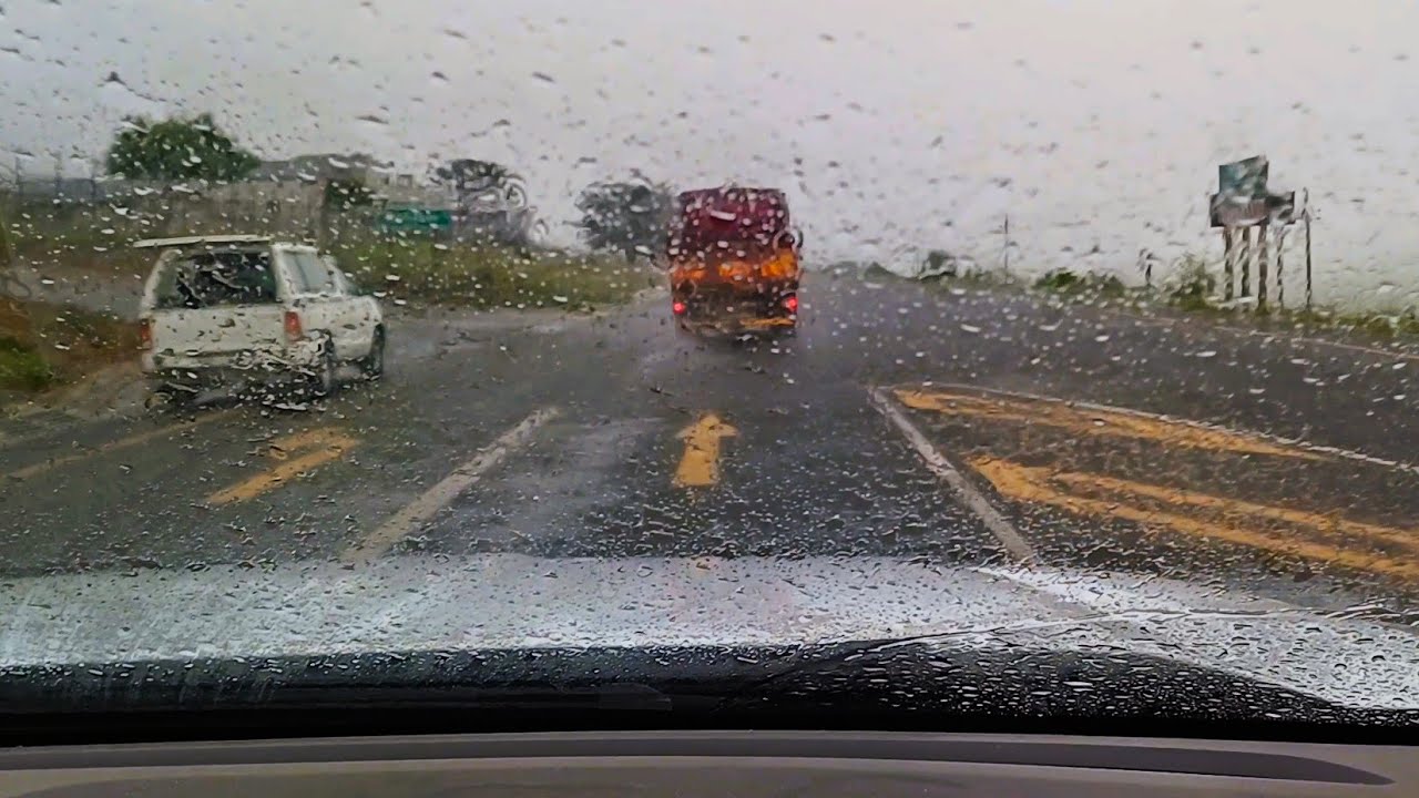 South Africa |  Rain on the R102 past Reebok