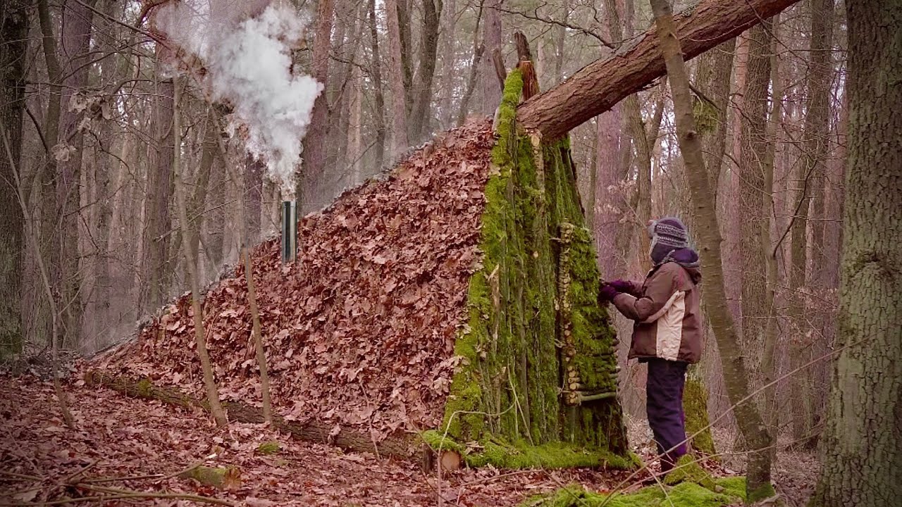 Building a Warm and Cozy Log Cabin for Survival Under a Fallen Tree. Secret Hut. Winter Bushcraft