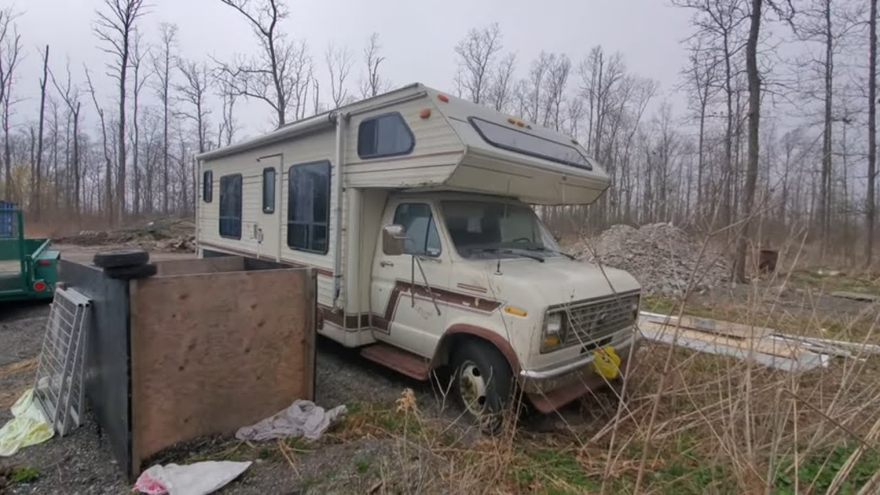 Abandoned 80s Ford Econoline RV