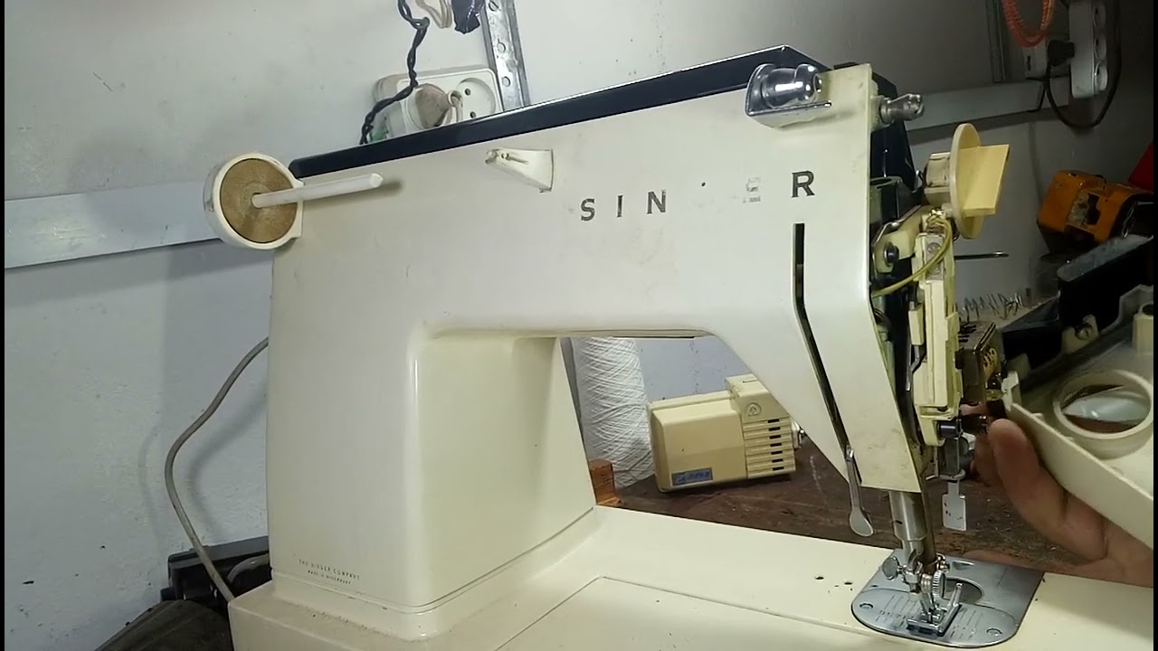 singer'''model''1000'''comment ouvrir les couverts du cette machine à coudre