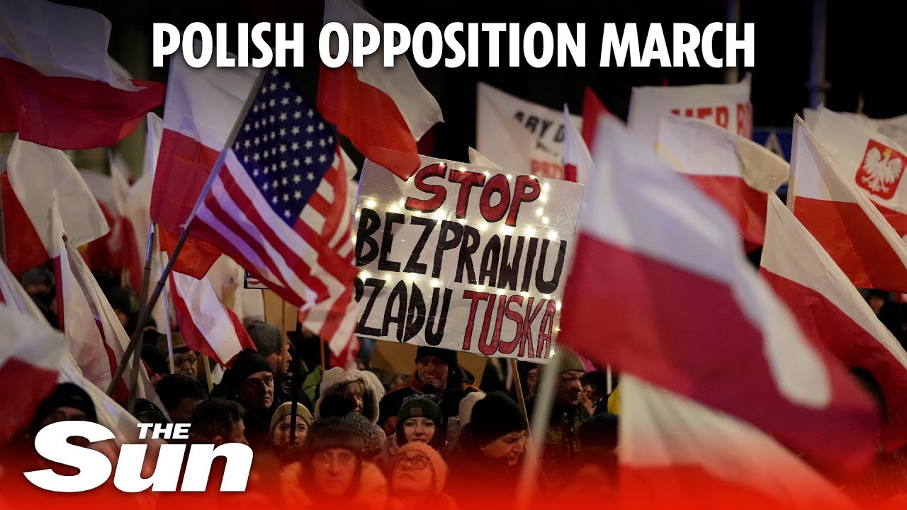 Thousands march through Warsaw in protest against arrest of ex-ministers
