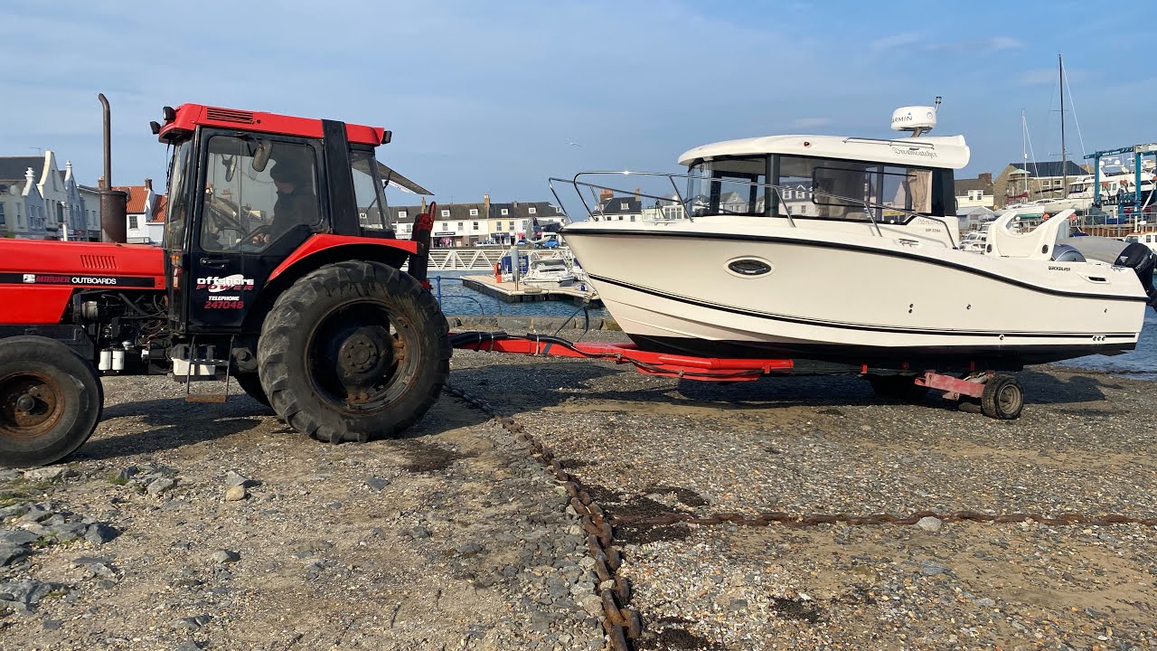 Quicksilver 755 Pilothouse being launched & returned to its mooring