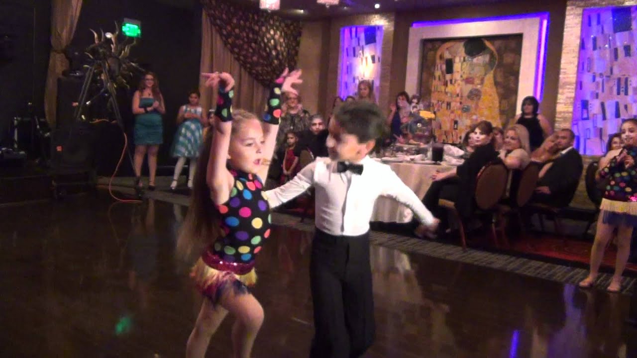Kids dancing cha cha, rumba, jive, and samba