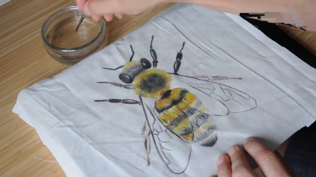 Honey bee quilt with inktense pencils and thread painting