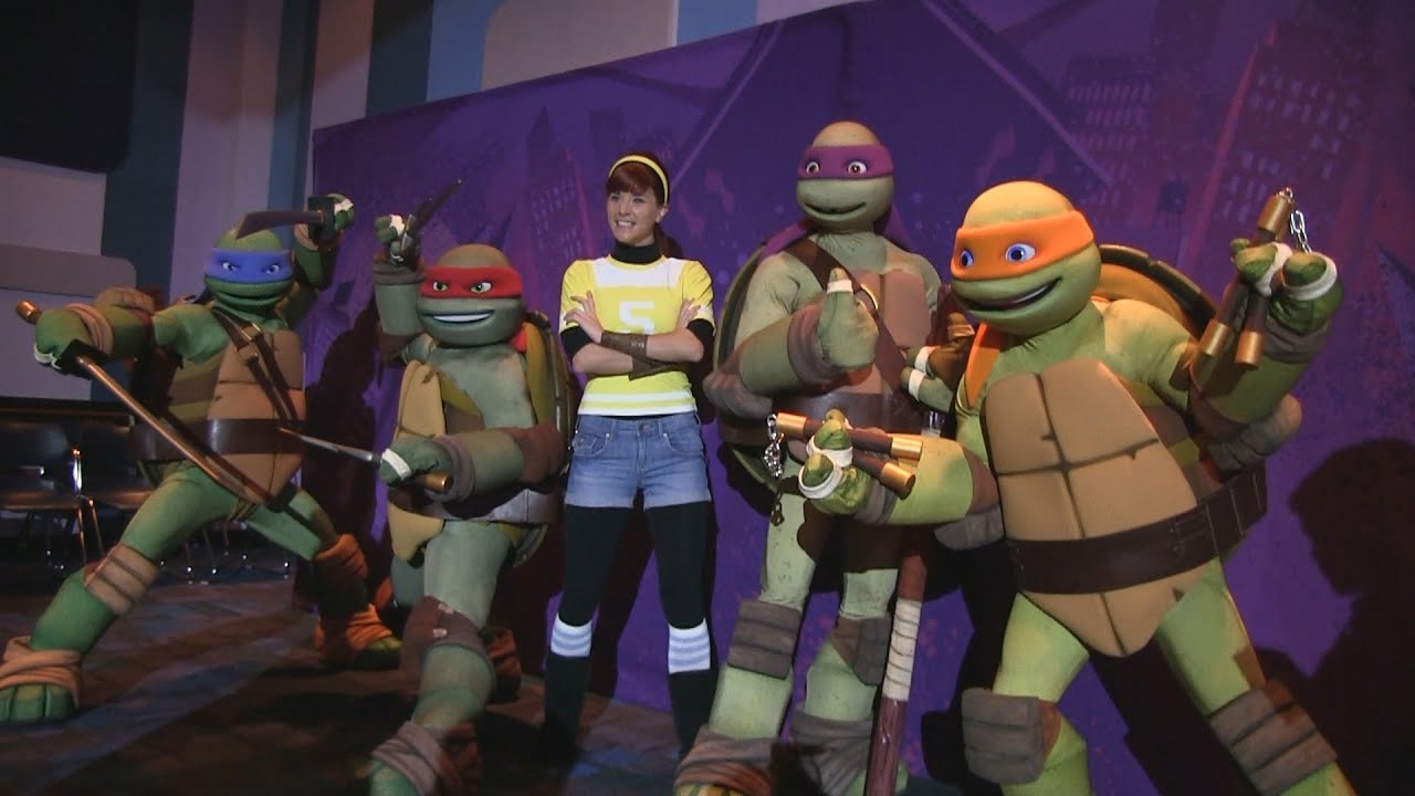 April O'Neil and the Teenage Mutant Ninja Turtles dance with and meet guests at Nickelodeon Suites