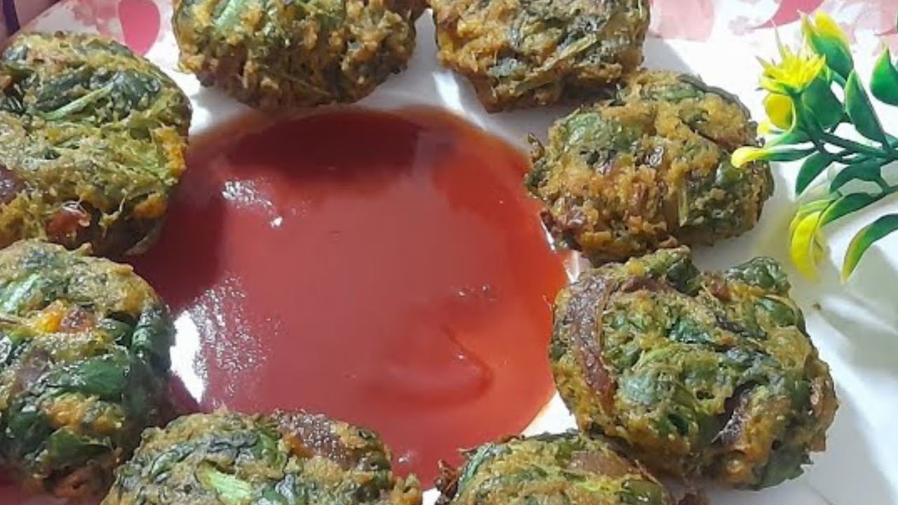 पालक  के मजेदार कुरकुरे  पकोड़े 😋#rinki 