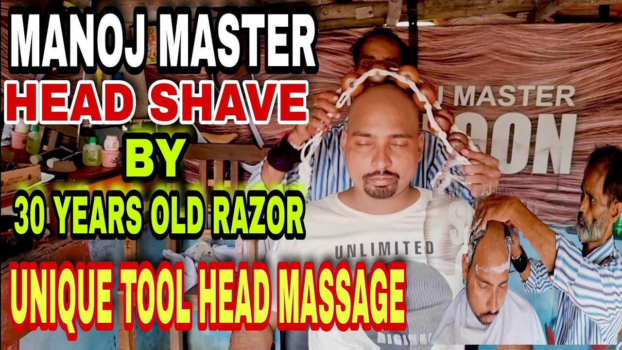 Indian Barber. Master Master Head Shave with 30 Years Old Razor And Wooden Tools Massage