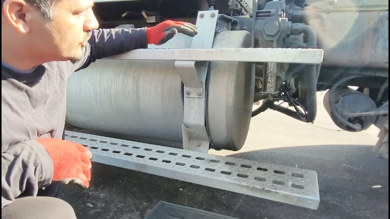 Replacing step bracket on Freightliner roll off truck