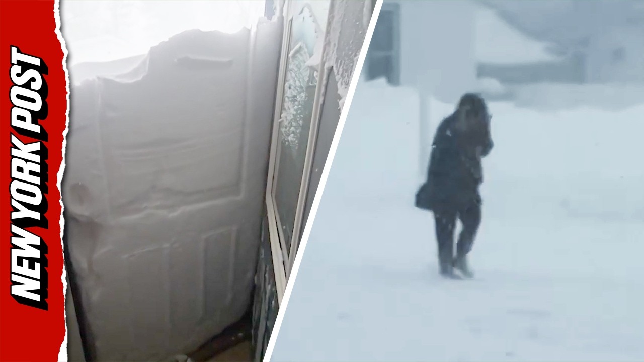 Record-breaking snowfall BURIES Michigan