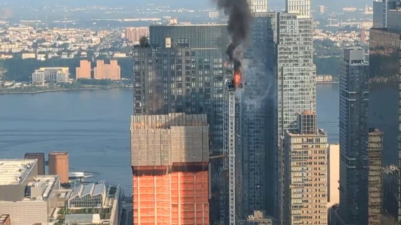 Burning crane collapses from New York City high-rise building