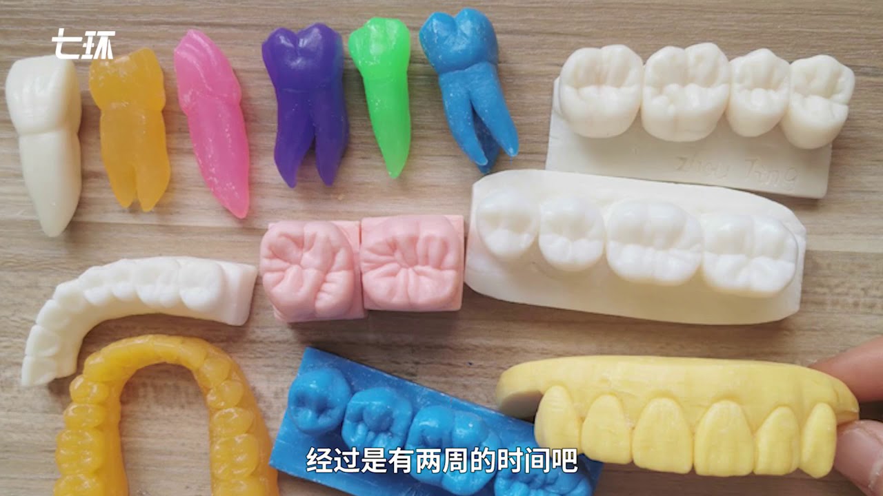 Chinese dental teacher carves dental models by using soaps to replace plaster and wax blocks at home