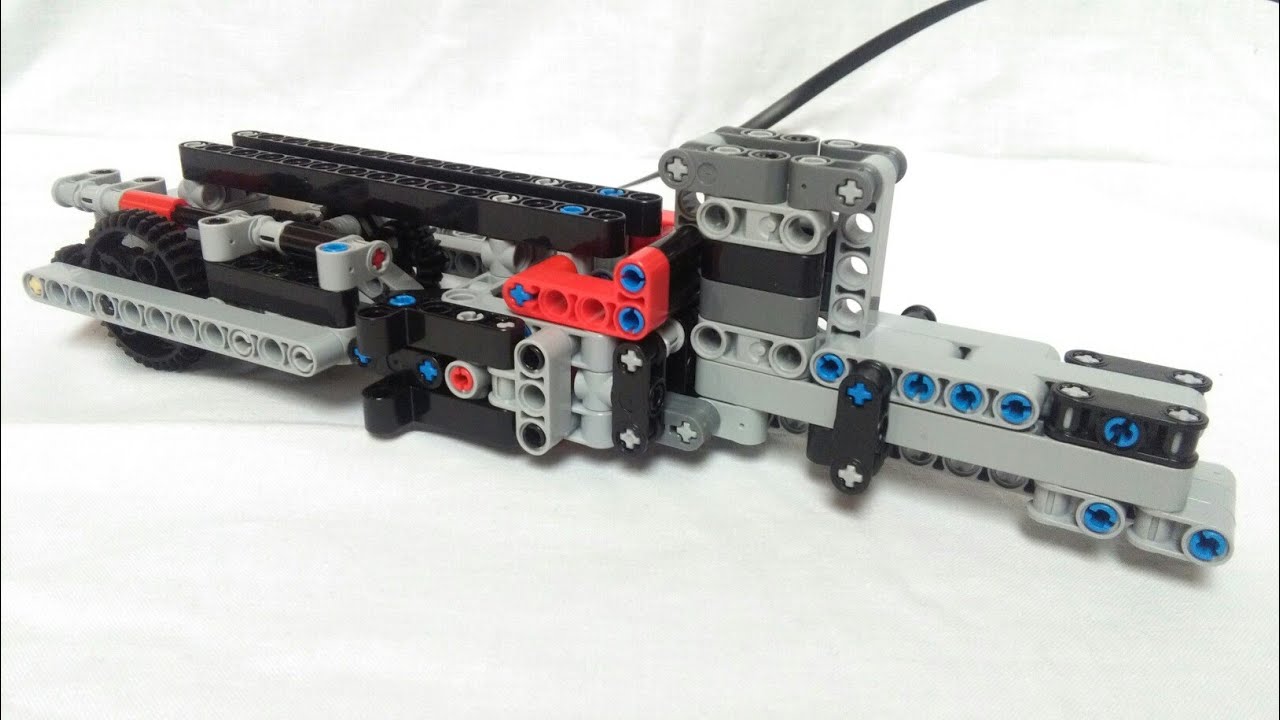 Lego automatic shooting mechanism