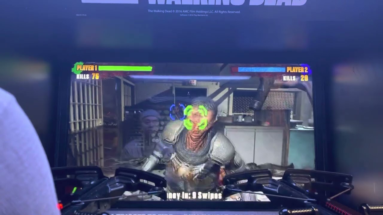 AMC Walking Dead zombie Arcade light gun game in 2023. Dad and 4 year old son play for high score