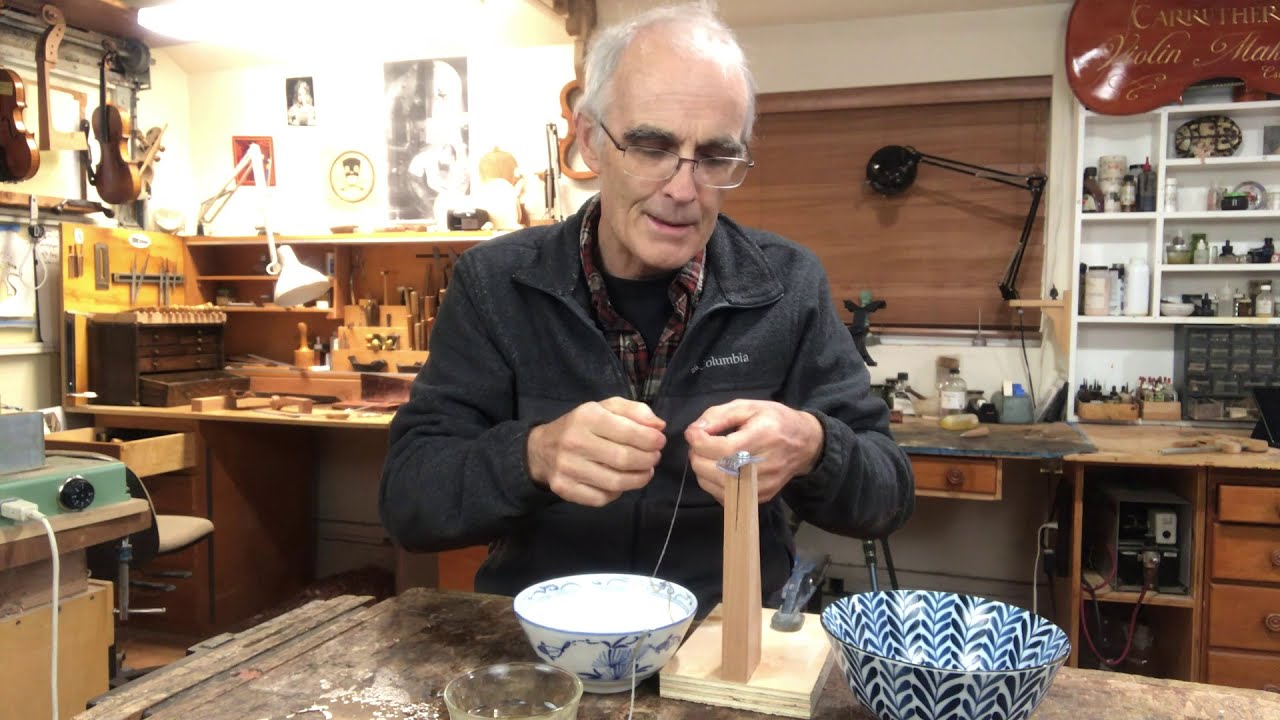 Making a violin tailgut. Part 2 twisting and polishing the gut.